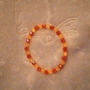 Minimalist handmade shiny and iridescent fun casual bright yellow & red bracelet